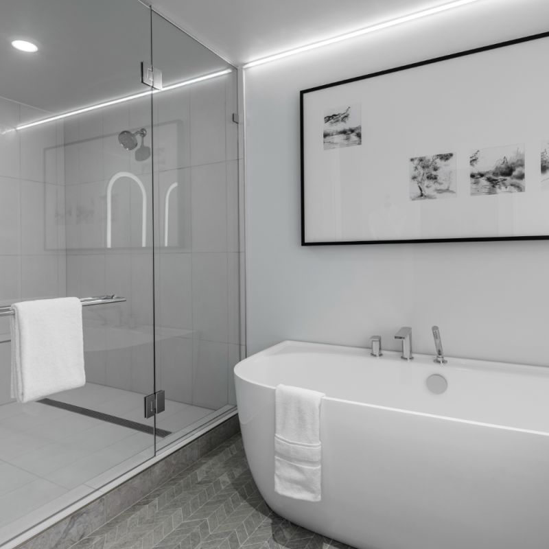 A Bathroom With A Glass Shower